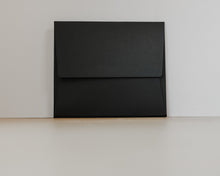 Load image into Gallery viewer, Simply Spaced archival media folder in black.